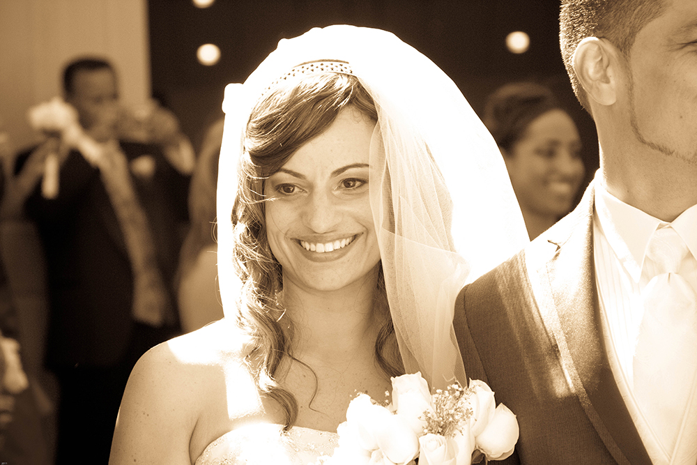 Wedding Photography - Bride leaving chruch